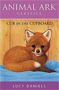 Image of Cub in the cupboard